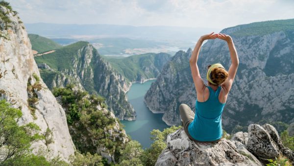 Kundalini Reiki. A woman awakening the dormant power of Kundalini that lies within her.